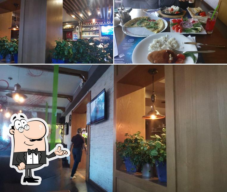 Посмотрите на этот снимок, где видны внутреннее оформление и еда в Греночка