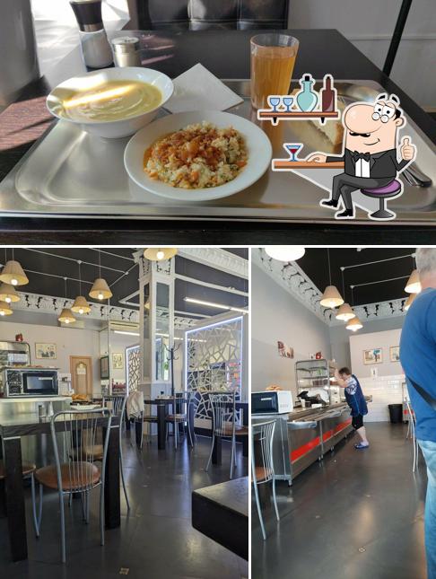 Посмотрите на это изображение, где видны внутреннее оформление и еда в Столовая на Советской