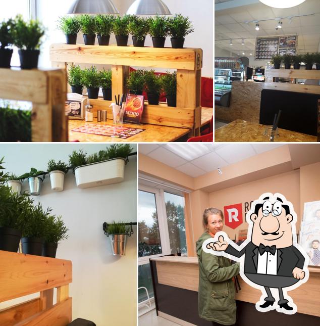 Посмотрите на внутренний интерьер "Роккета пицца"