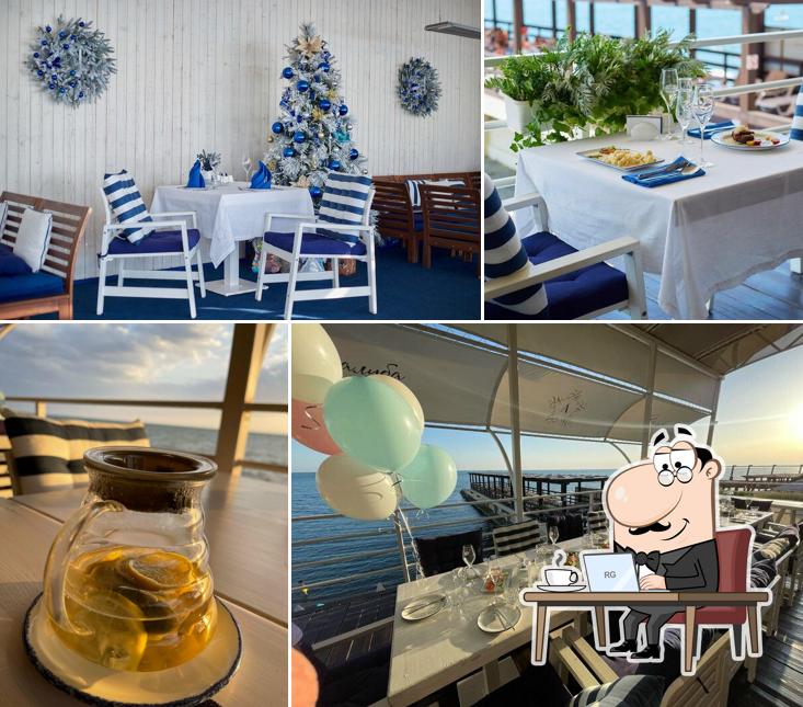 Посмотрите на внутренний интерьер "Ресторана Палуба"