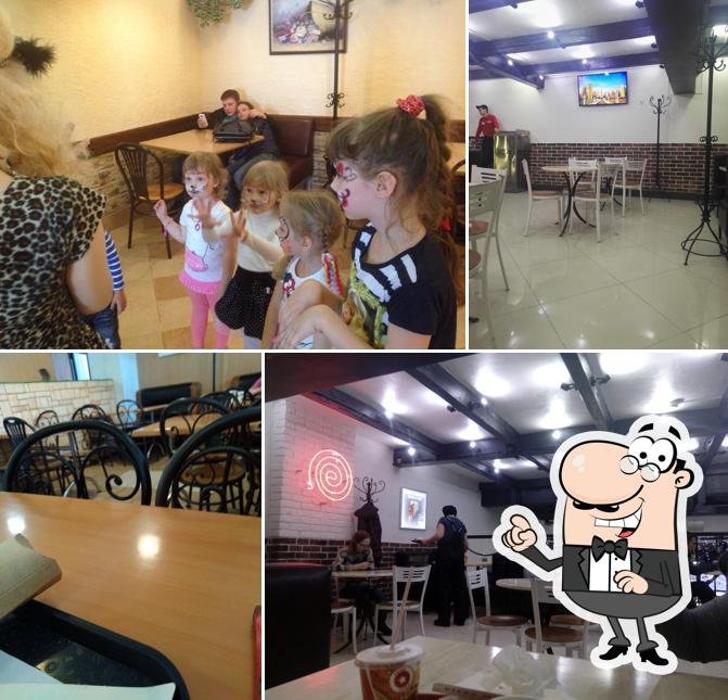 Посмотрите на внутренний интерьер "Pizza Mia"