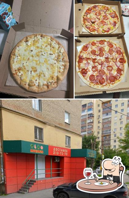 Снимок, на котором видны еда и внешнее оформление в Пицца-клуб.рф