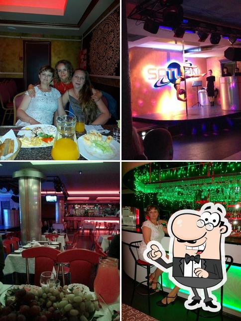 Посмотрите на внутренний интерьер "Сатурн Кафе"