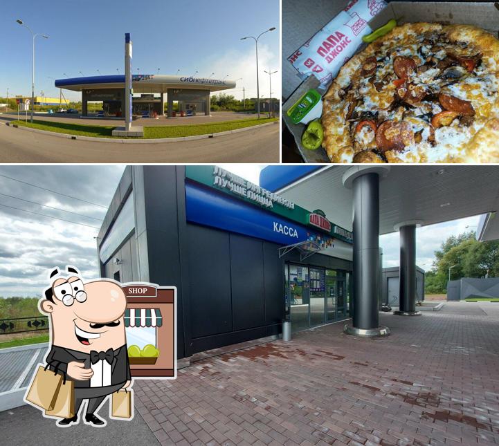 Это фото, где изображены внешнее оформление и еда в Папа Джонс