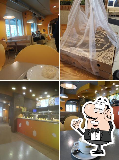 Посмотрите на внутренний интерьер "Пиццерии Cheez"