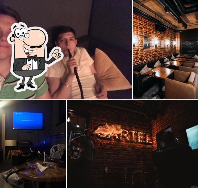 Посмотрите на внутренний интерьер "Cartel Lounge"