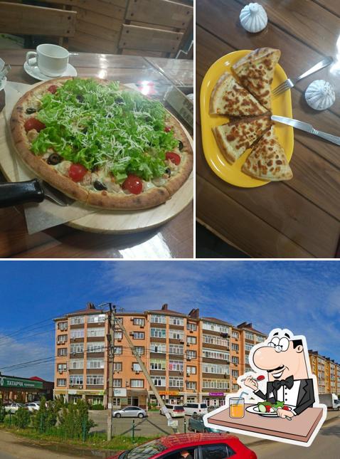 Это фотография, где изображены еда и внешнее оформление в Pizza-puri