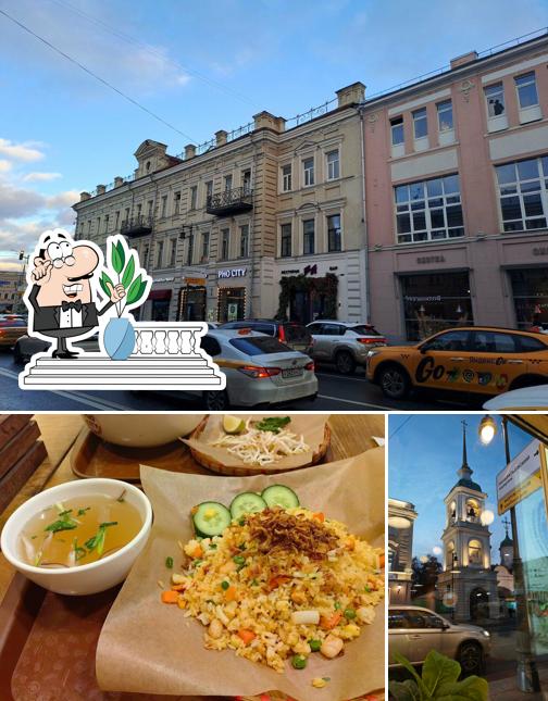 Взгляните на эту фотографию, где видны внешнее оформление и еда в Pho City