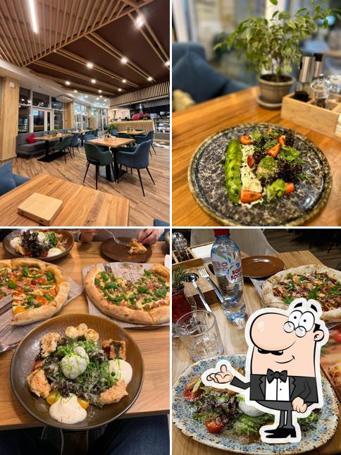 Посмотрите на внутренний интерьер "Пиццатория"