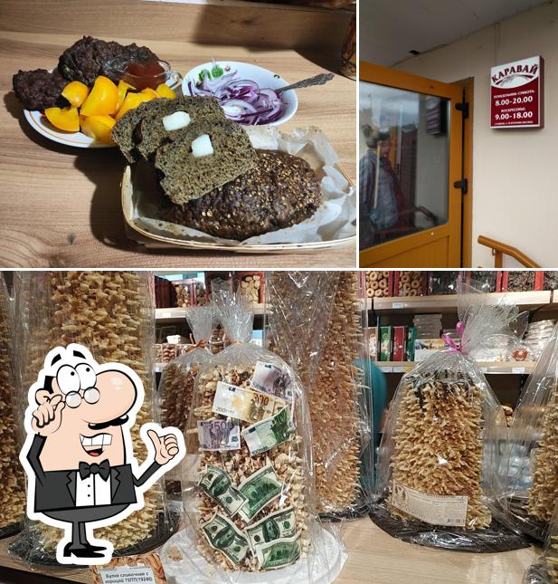 Забронируйте столик в "Каравай"