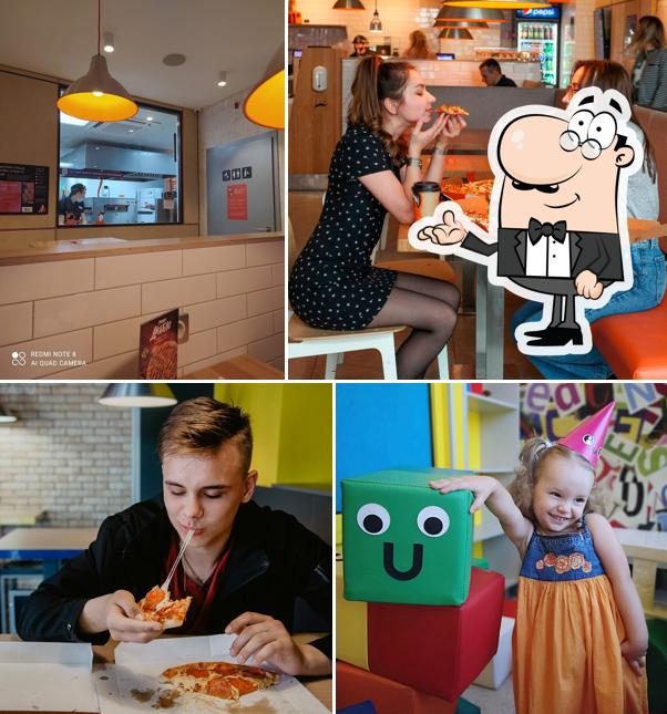 Забронируйте столик в "Додо Пицца"