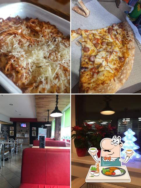 Еда и внутреннее оформление - все это можно увидеть на этом фото из Joy's Pizza