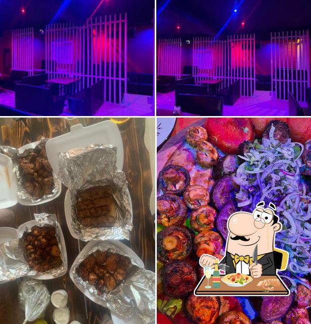 Снимок, на котором видны еда и внутреннее оформление в Медведь