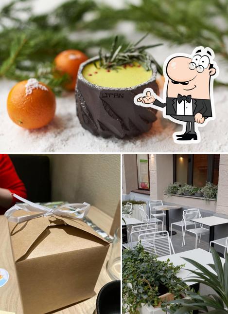 Снимок, на котором видны внутреннее оформление и еда в J'pan