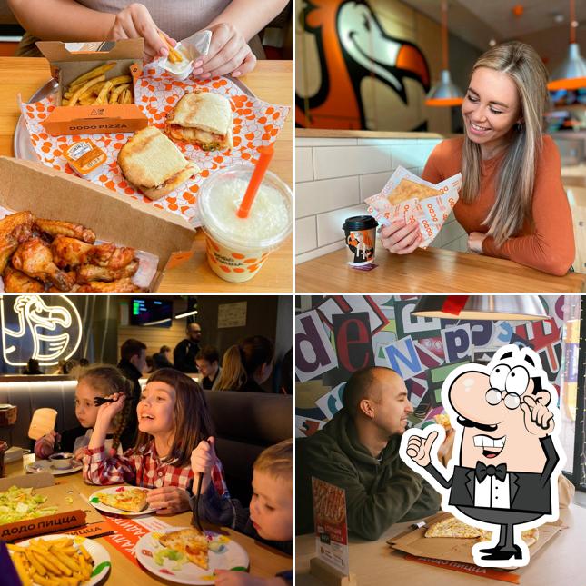 Это фото, где изображены внутреннее оформление и напитки в Додо Пицца