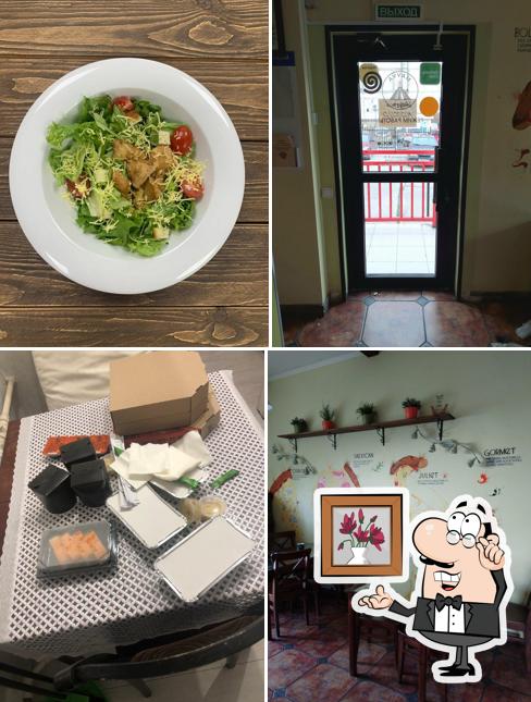 Посмотрите на внутренний интерьер "Хлеба из тандыра, Маууа Pizza."