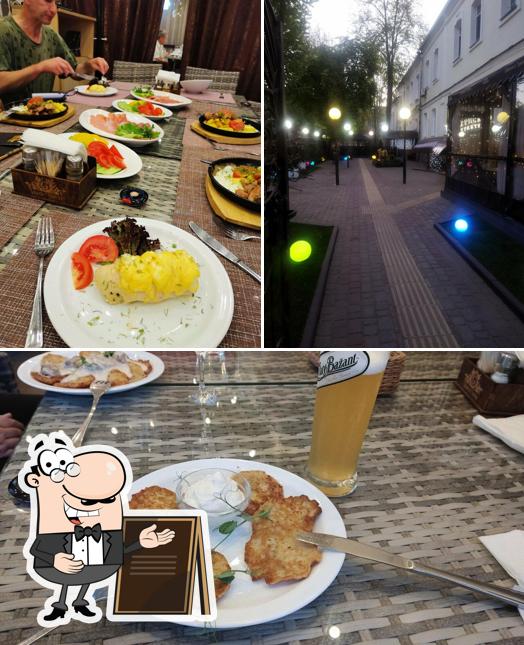 Взгляните на этот снимок, где видны внешнее оформление и внутреннее оформление в Gubernskiy Traktir Restaurant