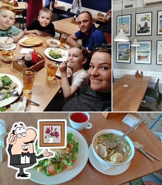 Фотография, на которой видны внутреннее оформление и напитки в Буза