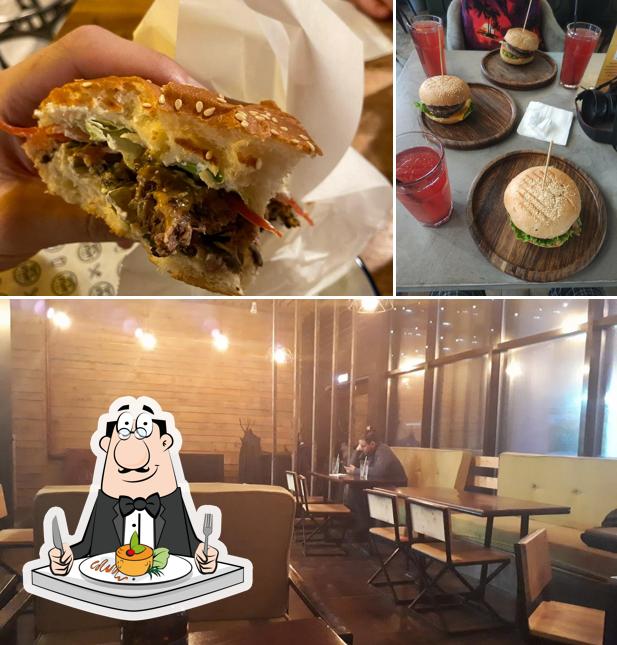 Посмотрите на это изображение, где видны еда и внутреннее оформление в Супер Бургер