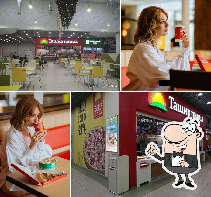 Посмотрите на внутренний интерьер "Ташира Пицца"