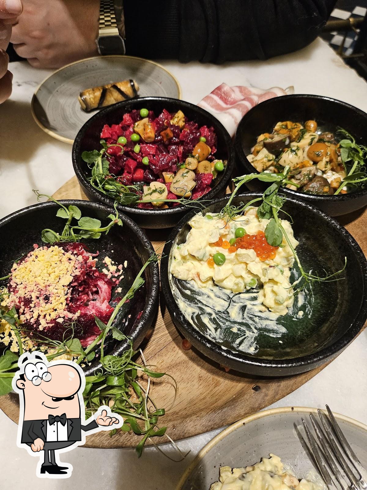 Посмотрите на внутренний интерьер "ZIMA Soho Restaurant".