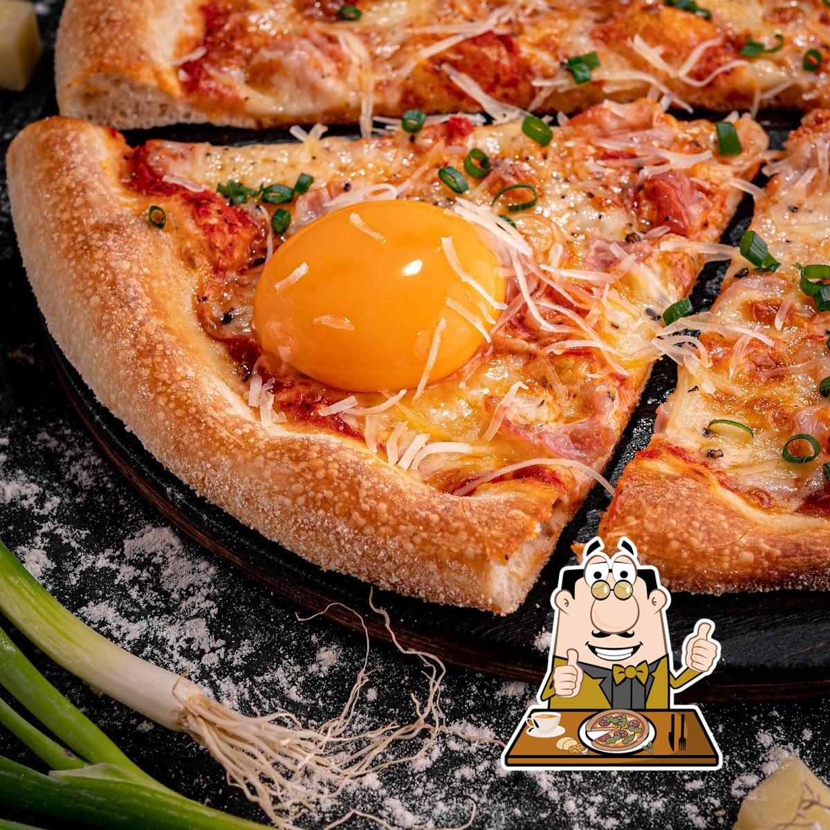В "Artumi Pizza" вы можете попробовать  пиццу.