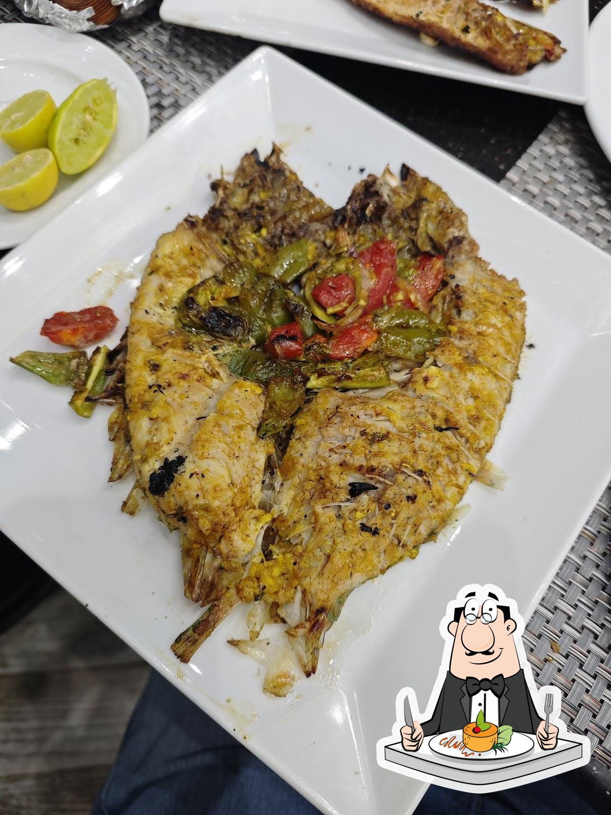 Еда в "Scampi Sea food Restaurant"