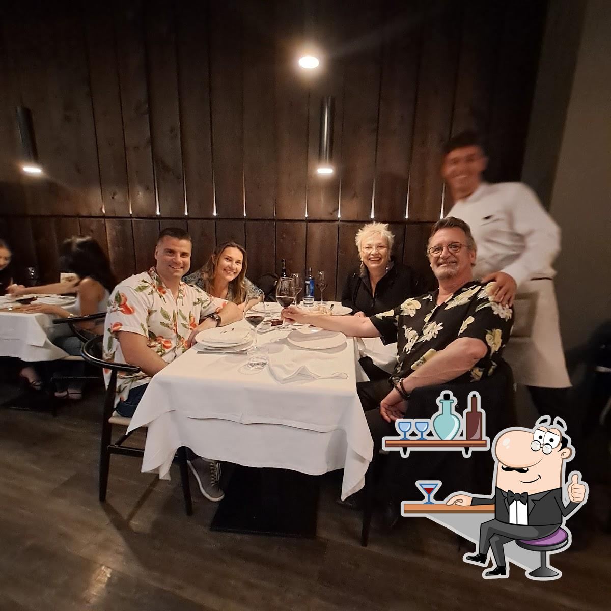 Посмотрите на внутренний интерьер "Pampa Grill Parrilla y carnes argentinas Málaga Centro".