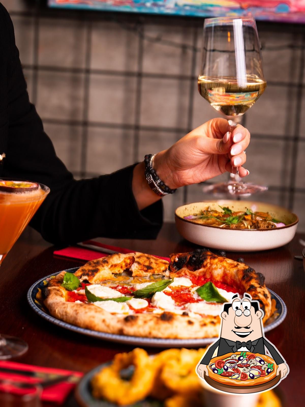 В "Bottegas - Pizza neapolitańska Włoska restauracja Śródmieście" вы можете  отведать пиццу.