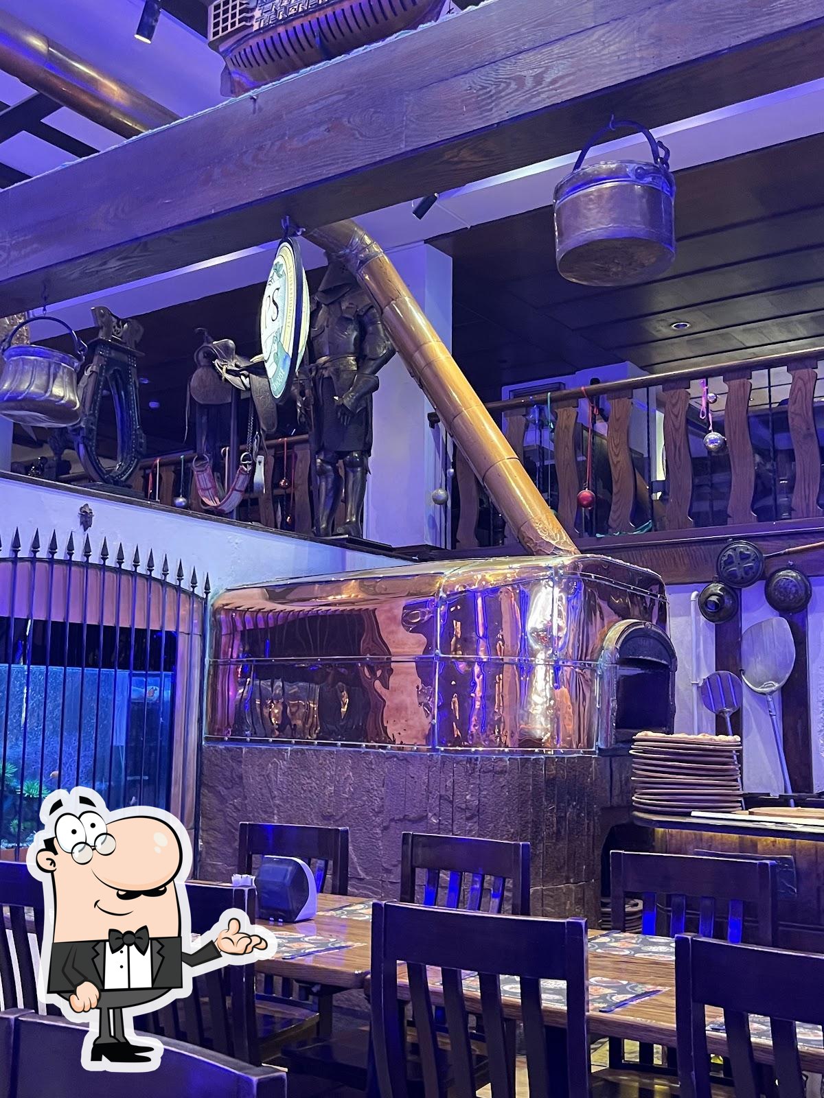 Забронируйте столик в "Hops Brewhouse".