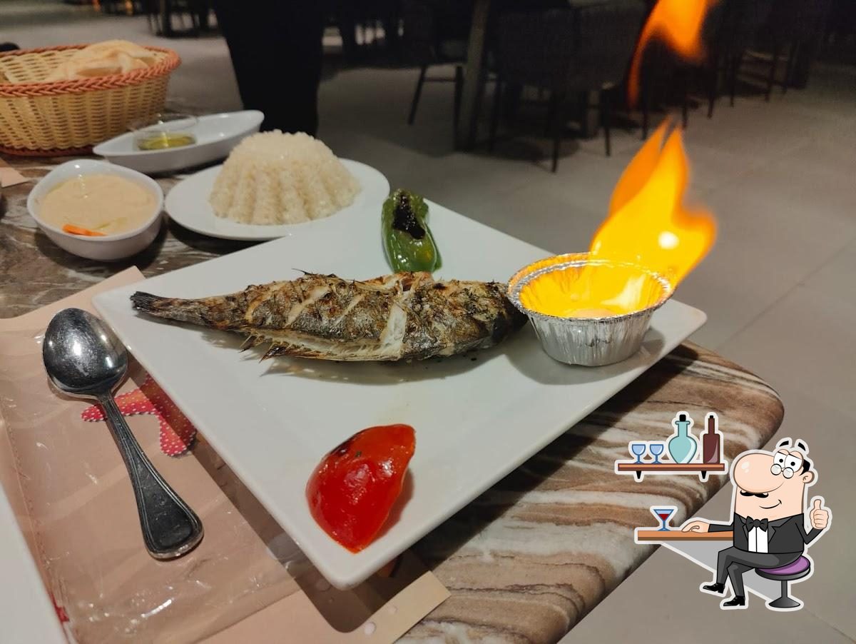 Забронируйте столик в "Star Fish Restaurant".
