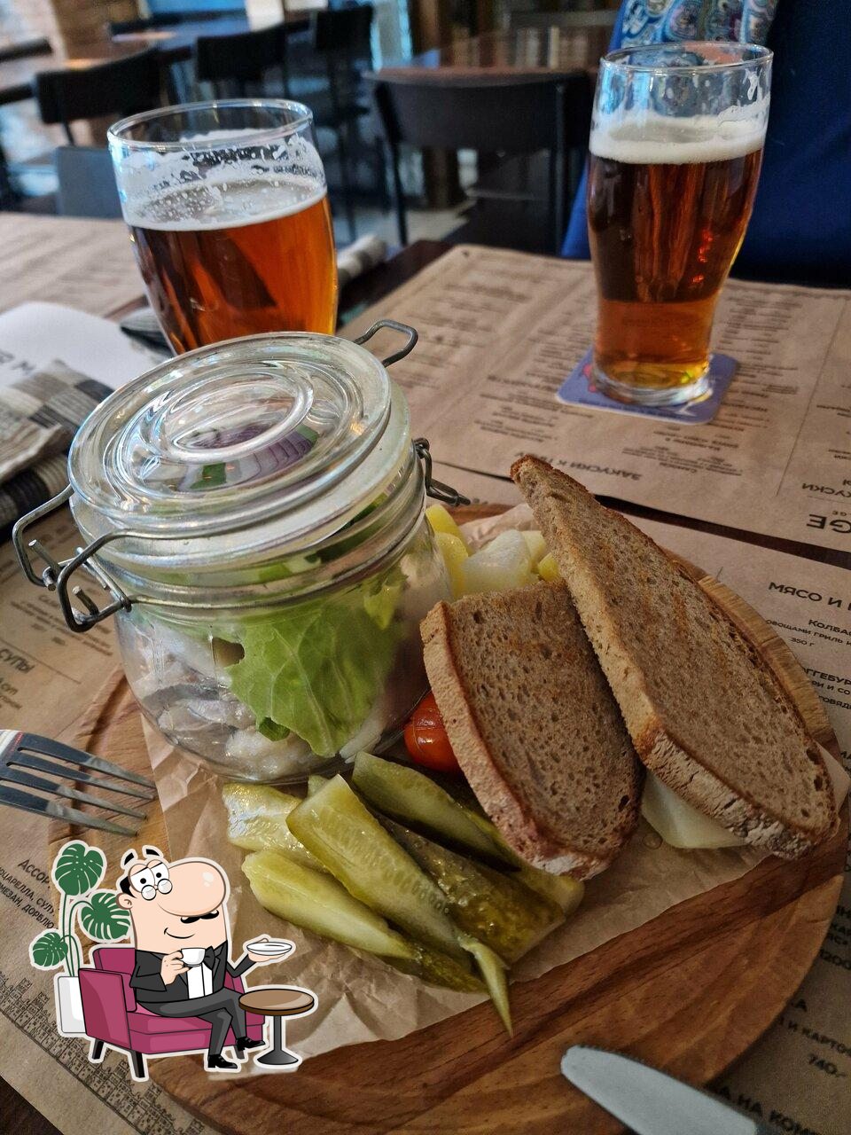 Посмотрите на внутренний интерьер "Brugge Brasserie Belge".