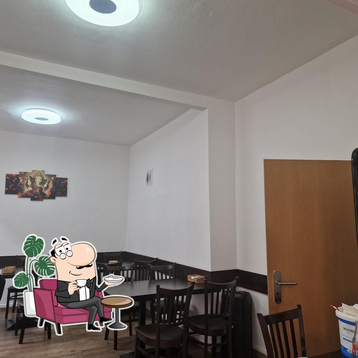 Забронируйте столик в "Ganesha Restaurant".