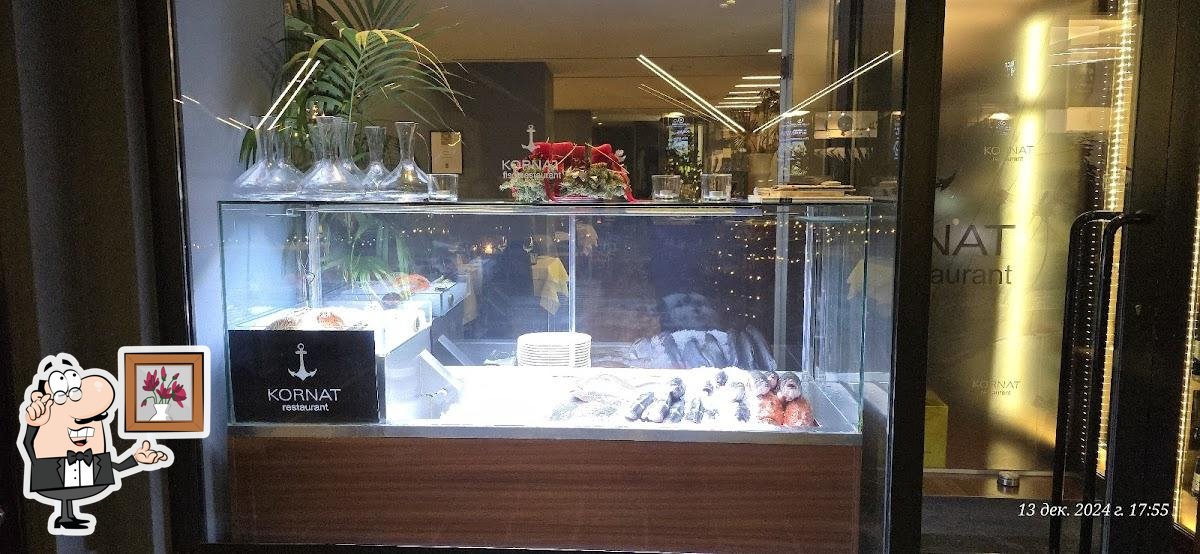 Посмотрите на внутренний интерьер "Fischrestaurant Kornat".