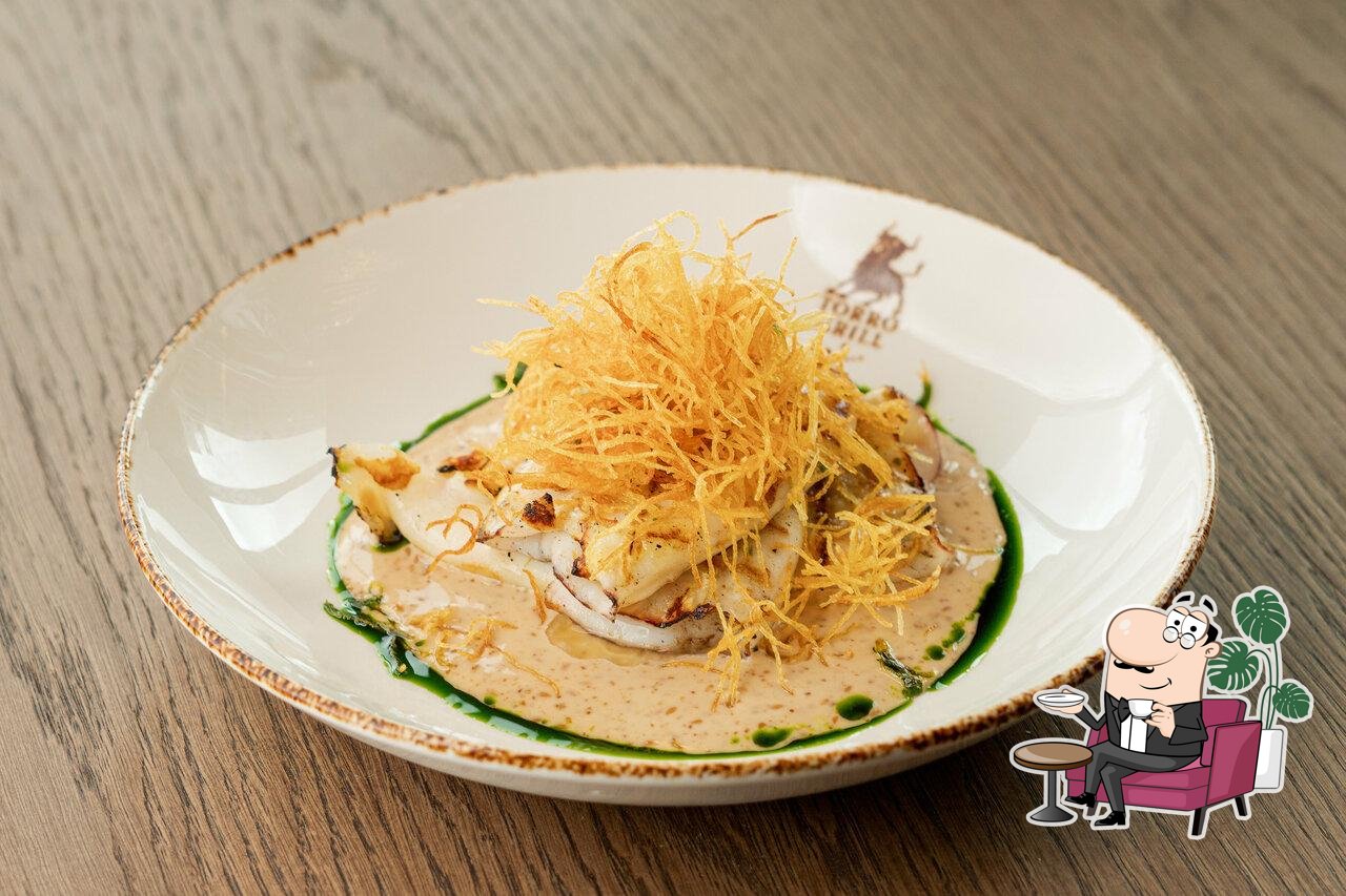 Посмотрите на внутренний интерьер "Torro Grill".