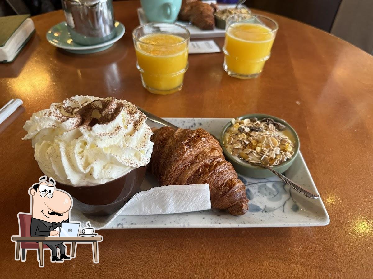 Посмотрите на внутренний интерьер "L'Arc Café Brasserie Restaurant".