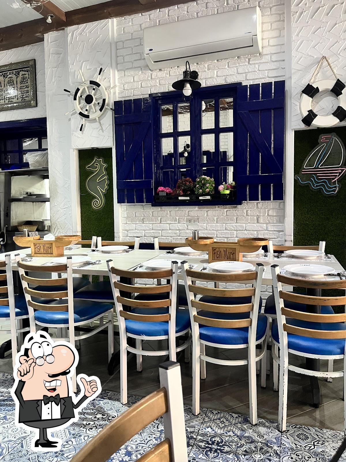 Посмотрите на внутренний интерьер "Fish Mart Seafood".