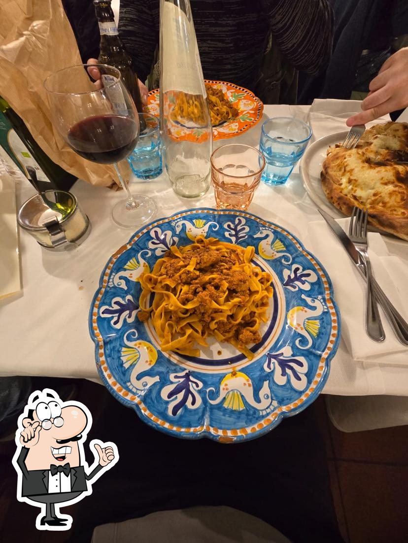 Интерьер "Trattoria Pizzeria La Mela".