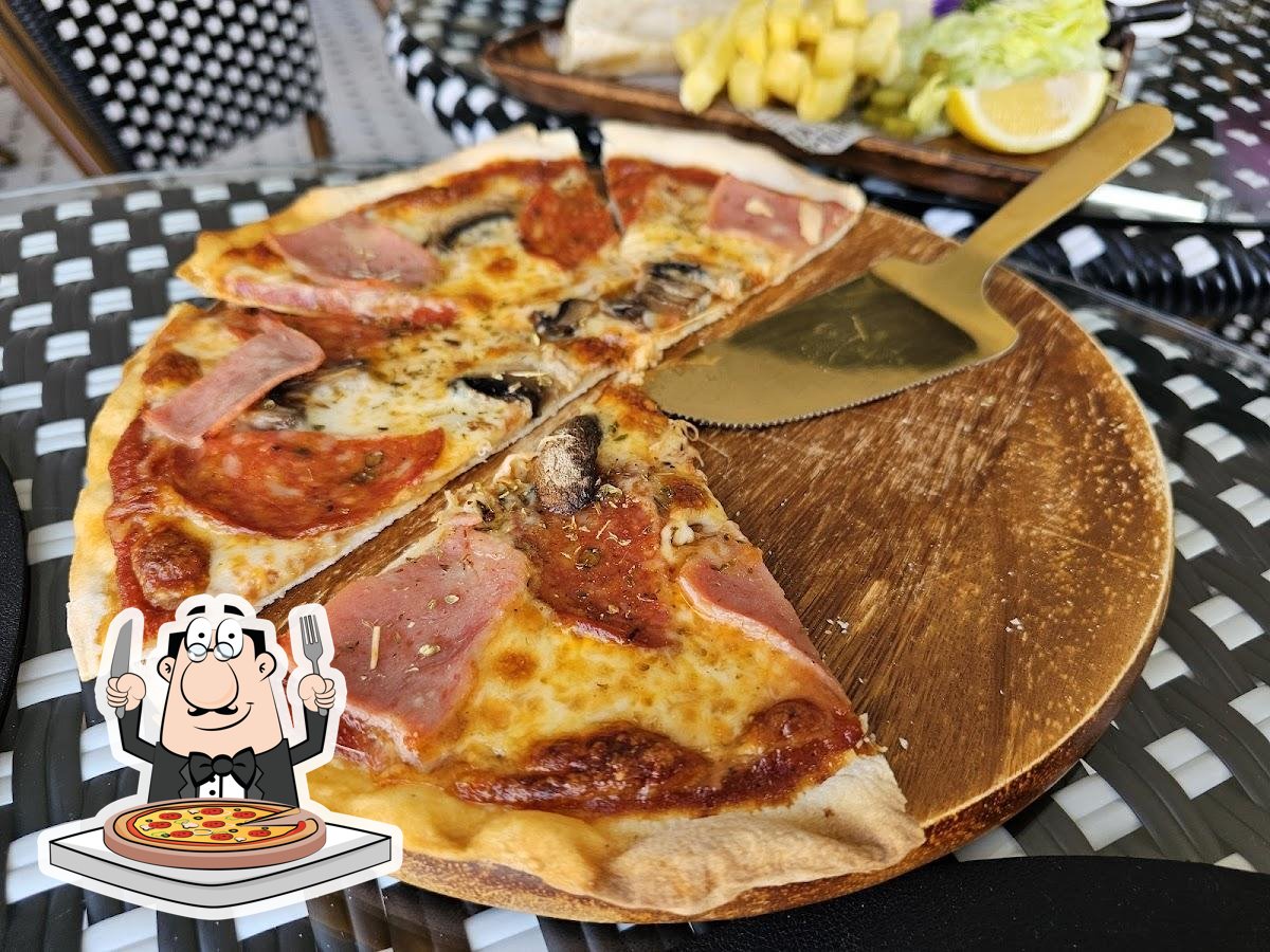  Отведайте пиццу в "Felici Pizza Kitchen".