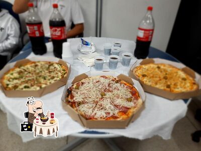 Comida em Pizzaria Benitta