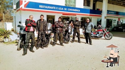 Você pode espairecer no na área externa do Restaurante e Lancheria Alvorada