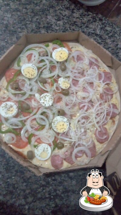 Comida em Pizzaria Alves
